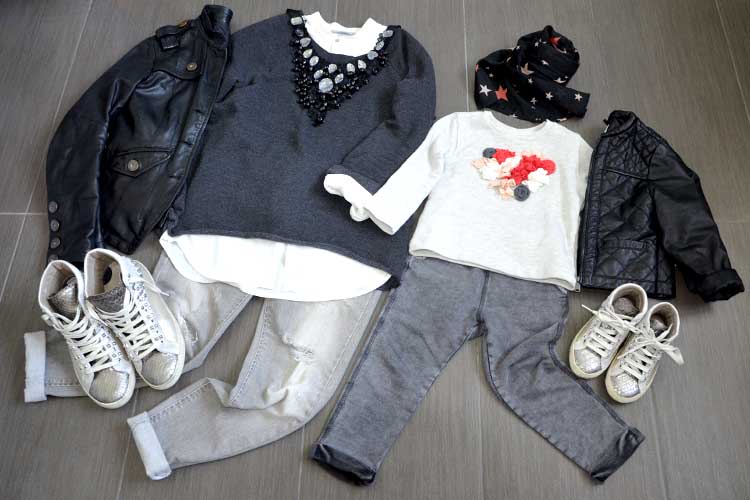 outfit mom and daughter jeans strappati felpa applicazioni giacca in pelle e sneakers uguali crime con borchie